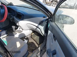 2009 Hyundai Accent Auto GLS z VIN KMHCN46C39U334712, wystawiony jako IAAI lot #42334874 z przebiegiem 193 090 mil mil oraz . Historia ofert i sprzedaży dostępna na DreamBid. Obrazek 5.