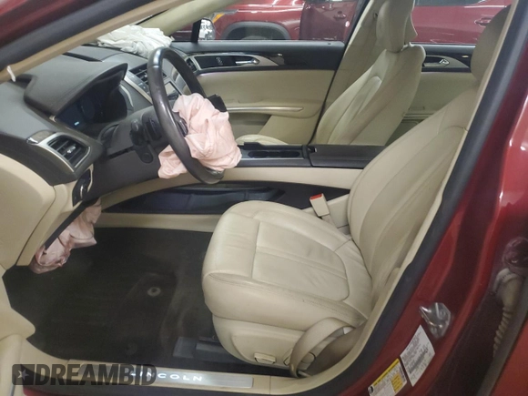 2015 Lincoln MKZ z VIN 3LN6L2J92FR624638, wystawiony jako Copart lot #57158245 z przebiegiem 150 045 mil mil oraz Szkoda całkowita • Salvage title. Historia ofert i sprzedaży dostępna na DreamBid. Obrazek 7.