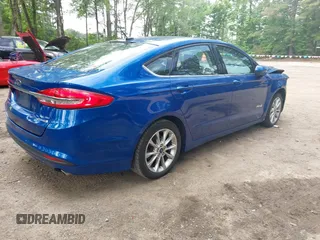 2017 Ford Fusion Hybrid SE with VIN 3FA6P0LU1HR162662, listed as a IAAI auction lot 42465793 with 116,414 mi miles and . Bid and sale history available at DreamBid. Image 4.