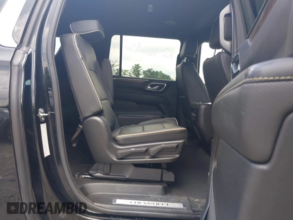 2023 Chevrolet Suburban Premier with VIN 1GNSKFKDXPR385697, listed as a IAAI auction lot 42601771 with 75,487 mi miles and . Bid and sale history available at DreamBid. Image 8.
