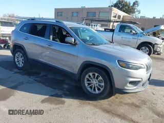 2019 Jeep Cherokee Latitude with VIN 1C4PJLCB2KD296791, listed as a IAAI auction lot 41772783 with 180,617 mi miles. Bid and sale history available at carsss.com. Image 1.