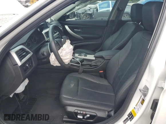 2017 BMW 3 Series 320i xDrive with VIN WBA8E5G59HNU22301, listed as a Copart auction lot 56942365 with 118,041 mi miles and Salvage title. Bid and sale history available at DreamBid. Image 7.