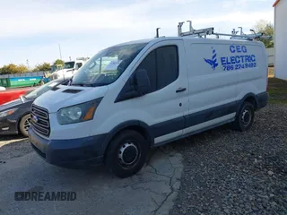 2015 Ford Transit Cargo with VIN 1FTYE1YM0FKB31248, listed as a IAAI auction lot 41703474 with 238,925 mi miles and . Bid and sale history available at DreamBid. Image 2.