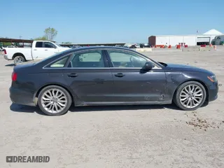 2012 Audi A6 3.0T Prestige with VIN WAUHGBFC8CN078333, listed as a IAAI auction lot 42001507 with 121,527 mi miles. Bid and sale history available at carsss.com. Image 13.