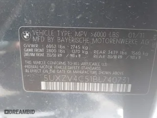 2011 BMW X5 35i with VIN 5UXZV4C51BL740731, listed as a IAAI auction lot 41771257 with 148,638 mi miles. Bid and sale history available at carsss.com. Image 9.