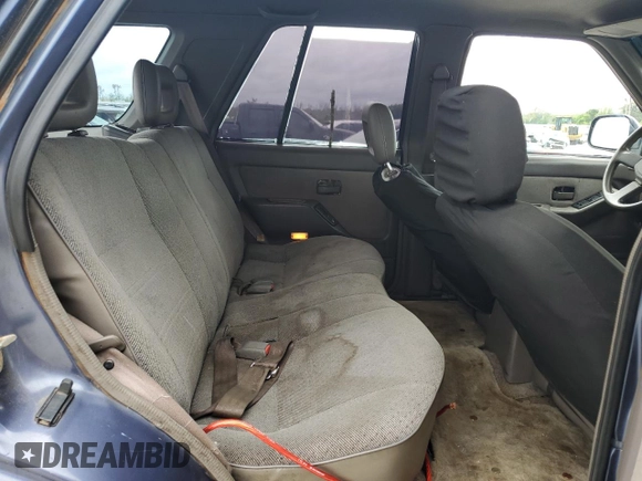 1995 Isuzu Rodeo LS with VIN 4S2CG58V9S4342391, listed as a Copart auction lot 71076344 with 220,708 mi miles and Salvage Title. Bid and sale history available at carsss.com. Image 10.