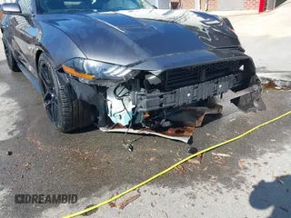 2018 Ford Mustang GT z VIN 1FA6P8CF3J5182601, wystawiony jako IAAI lot #41661225 z przebiegiem 67 898 mil mil oraz . Historia ofert i sprzedaży dostępna na DreamBid. Obrazek 6.