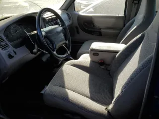 1999 Ford Ranger XL with VIN 1FTYR14V2XPA59072, listed as a Copart auction lot 84061714 with 193,166 mi miles and Salvage title. Bid and sale history available at DreamBid. Image 7.