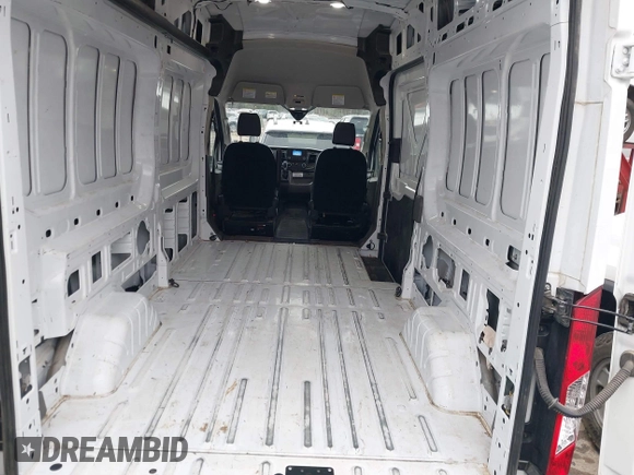 2022 Ford Transit Cargo z VIN 1FTBR1X84NKA82407, wystawiony jako IAAI lot #41503201 z przebiegiem 53 194 mil mil oraz . Historia ofert i sprzedaży dostępna na DreamBid. Obrazek 8.