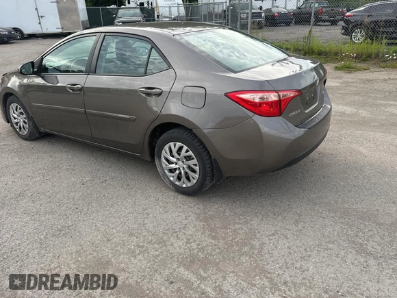 2019 Toyota Corolla L z VIN 2T1BURHE5KC220051, wystawiony jako Copart lot #61879415 z przebiegiem 196 200 mil mil oraz Czysty tytuł • Clean title. Historia ofert i sprzedaży dostępna na DreamBid. Obrazek 3.