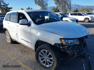 2021 Jeep Grand Cherokee Laredo X with VIN 1C4RJEAG2MC719395, listed as a IAAI auction lot 41338484 with 99,636 mi miles. Bid and sale history available at carsss.com. Image 1.