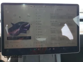 2024 Tesla Model Y с VIN 7SAYGDED3RF166676, выставлен на аукционе Copart как лот 60792165 с пробегом 22 445 миль миль и Списание • Salvage title. История ставок и продаж доступна на DreamBid. Изображение 9.
