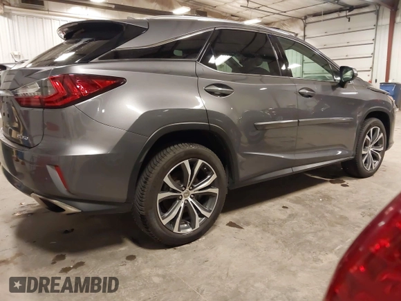2017 Lexus RX 350 with VIN 2T2BZMCA7HC121812, listed as a IAAI auction lot 41868533 with 101,128 mi miles and . Bid and sale history available at DreamBid. Image 4.