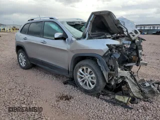 2020 Jeep Cherokee Latitude with VIN 1C4PJMCB6LD652067, listed as a Copart auction lot 48029875 with 127,562 mi miles and Salvage Title. Bid and sale history available at carsss.com. Image 4.