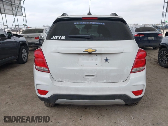 2020 Chevrolet Trax LT with VIN KL7CJLSBXLB010793, listed as a IAAI auction lot 41704879 with 124,915 mi miles and . Bid and sale history available at DreamBid. Image 16.