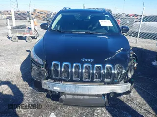 2018 Jeep Cherokee Latitude Plus with VIN 1C4PJMLB0JD507197, listed as a IAAI auction lot 41360448 with 61,877 mi miles and . Bid and sale history available at carsss.com. Image 6.