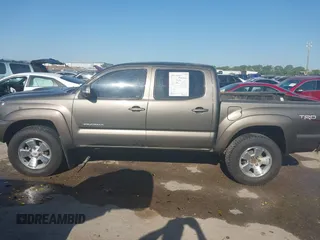 2013 Toyota Tacoma PreRunner z VIN 5TFJU4GN3DX040992, wystawiony jako IAAI lot #42022841 z przebiegiem 159 474 mil mil oraz . Historia ofert i sprzedaży dostępna na DreamBid. Obrazek 14.