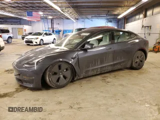 2022 Tesla Model 3 Long Range z VIN 5YJ3E1EB1NF317762, wystawiony jako Copart lot #46276945 z przebiegiem 28 365 mil mil oraz Szkoda całkowita • Salvage title. Historia ofert i sprzedaży dostępna na DreamBid. Obrazek 1.
