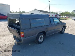 1992 Mazda B-Series Truck with VIN JM2UF3136N0270881, listed as a IAAI auction lot 41814384 with 202,785 mi miles and . Bid and sale history available at DreamBid. Image 4.