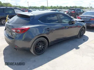 2015 Mazda 3 S Grand Touring with VIN JM1BM1M34F1258936, listed as a IAAI auction lot 42071464 with 100,933 mi miles and . Bid and sale history available at DreamBid. Image 4.