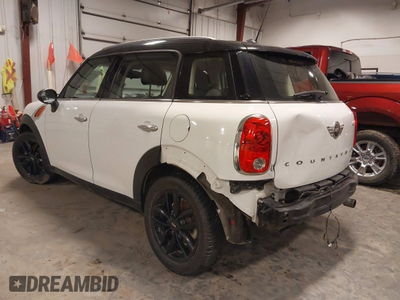 2014 MINI Countryman with VIN WMWZB3C57EWR42476, listed as a IAAI auction lot 41716731 with 94,378 mi miles and . Bid and sale history available at DreamBid. Image 3.