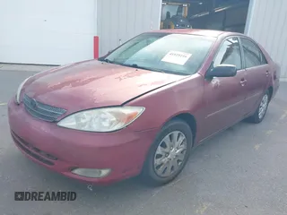 2003 Toyota Camry LE with VIN 4T1BE32K73U161691, listed as a IAAI auction lot 41929216 with 274,582 mi miles and . Bid and sale history available at DreamBid. Image 2.