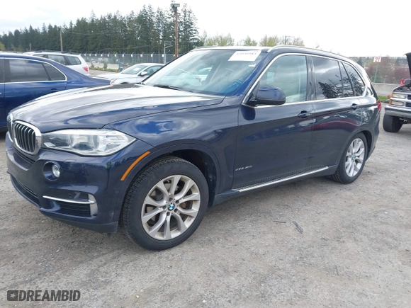 2015 BMW X5 xDrive35d with VIN 5UXKS4C55F0J98874, listed as a IAAI auction lot 42030583 with 151,079 mi miles. Bid and sale history available at carsss.com. Image 2.