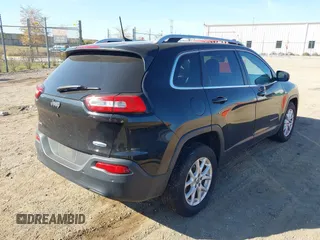 2016 Jeep Cherokee Latitude with VIN 1C4PJMCB2GW301117, listed as a IAAI auction lot 40647017 with 56,348 mi miles and . Bid and sale history available at DreamBid. Image 4.