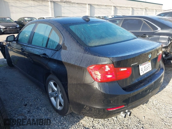 2015 BMW 3 Series 328i xDrive with VIN WBA3B3C57FF547110, listed as a IAAI auction lot 41870141 with 49,412 mi miles and . Bid and sale history available at carsss.com. Image 3.