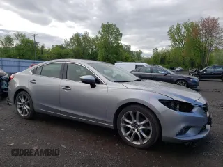 2014 Mazda 6 i Grand Touring with VIN JM1GJ1W67E1116357, listed as a Copart auction lot 54351205 with 111,190 mi miles and Salvage Title. Bid and sale history available at DreamBid. Image 4.