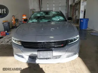 2023 Dodge Charger SXT with VIN 2C3CDXBG2PH587879, listed as a Copart auction lot 54262165 with 60,663 mi miles and Salvage Title. Bid and sale history available at carsss.com. Image 5.
