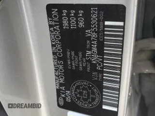 2015 Kia Optima LX z VIN KNAGM4A78F5530621, wystawiony jako Copart lot #43874535 z przebiegiem Nie podano mil oraz Szkoda całkowita • Salvage title. Historia ofert i sprzedaży dostępna na DreamBid. Obrazek 14.