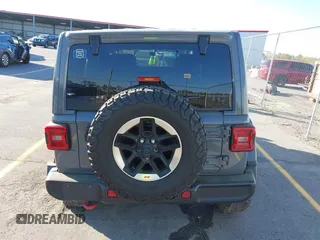 2020 Jeep Wrangler Unlimited Rubicon with VIN 1C4HJXFN4LW136516, listed as a IAAI auction lot 41874403 with 87,576 mi miles. Bid and sale history available at carsss.com. Image 16.