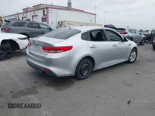 2016 Kia Optima LX with VIN 5XXGT4L34GG023812, listed as a IAAI auction lot 42034160 with 96,720 mi miles and . Bid and sale history available at DreamBid. Image 4.
