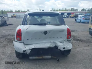 2014 MINI Countryman z VIN WMWZB3C50EWR37412, wystawiony jako IAAI lot #42330526 z przebiegiem 139 310 mil mil oraz . Historia ofert i sprzedaży dostępna na DreamBid. Obrazek 17.