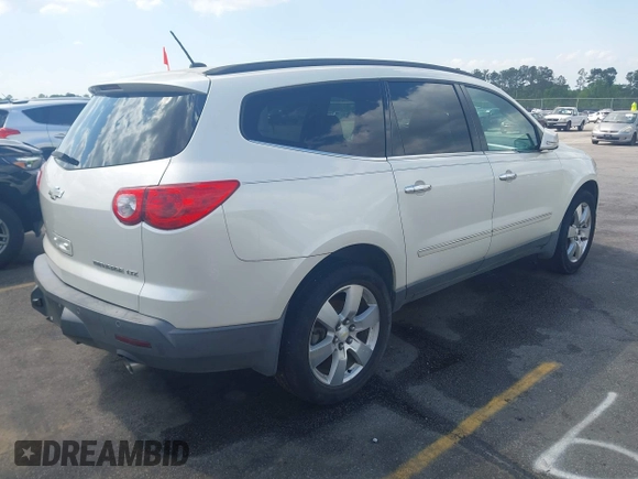 2011 Chevrolet Traverse LTZ with VIN 1GNKVLED5BJ167465, listed as a IAAI auction lot 42002979 with 167,271 mi miles and . Bid and sale history available at DreamBid. Image 4.