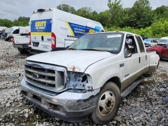 2001 Ford F-350 XL with VIN 1FTWW32F11EB16761, listed as a Copart auction lot 62511635 with 257,065 mi miles and Salvage title. Bid and sale history available at DreamBid. Image 1.