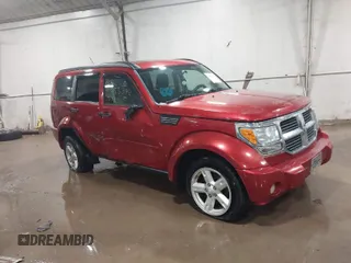 2009 Dodge Nitro SXT with VIN 1D8GU28KX9W541704, listed as a IAAI auction lot 41653392 with 167,784 mi miles. Bid and sale history available at carsss.com. Image 1.