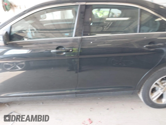 2015 Ford Taurus SEL with VIN 1FAHP2E84FG190092, listed as a IAAI auction lot 42215979 with 187,871 mi miles and . Bid and sale history available at DreamBid. Image 14.