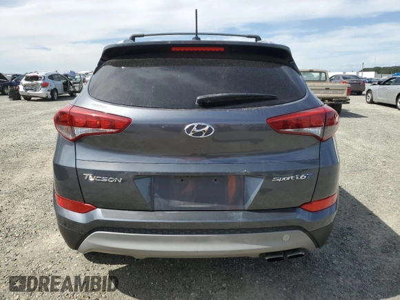2017 Hyundai Tucson Value z VIN KM8J33A28HU390391, wystawiony jako Copart lot #56764455 z przebiegiem 110 616 mil mil oraz Czysty tytuł • Clean title. Historia ofert i sprzedaży dostępna na DreamBid. Obrazek 6.