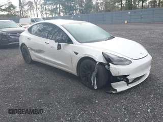 2021 Tesla Model 3 Long Range with VIN 5YJ3E1EB8MF974007, listed as a IAAI auction lot 41915513 with 107,354 mi miles and . Bid and sale history available at carsss.com. Image 1.