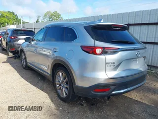 2020 Mazda CX-9 Grand Touring with VIN JM3TCADY2L0406173, listed as a IAAI auction lot 42217230 with 110,465 mi miles and . Bid and sale history available at DreamBid. Image 3.