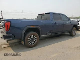 2021 GMC Sierra 3500HD AT4 z VIN 1GT49VEY9MF269605, wystawiony jako Copart lot #66775054 z przebiegiem 13 890 mil mil oraz Szkody całkowita. Historia ofert i sprzedaży dostępna na DreamBid. Obrazek 3.
