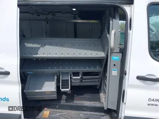2021 Ford Transit Cargo z VIN 1FTBR1Y89MKA66720, wystawiony jako IAAI lot #42064777 z przebiegiem 112 171 mil mil oraz . Historia ofert i sprzedaży dostępna na DreamBid. Obrazek 8.