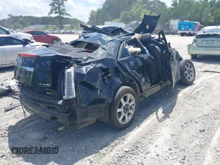 2008 Cadillac CTS RWD with VIN 1G6DF577080143965, listed as a IAAI auction lot 39774534 with 154,289 mi miles and . Bid and sale history available at DreamBid. Image 4.