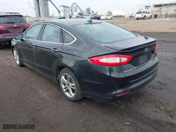 2015 Ford Fusion Titanium Hybrid with VIN 3FA6P0RU6FR299374, listed as a IAAI auction lot 41576007 with 191,285 mi miles. Bid and sale history available at carsss.com. Image 3.
