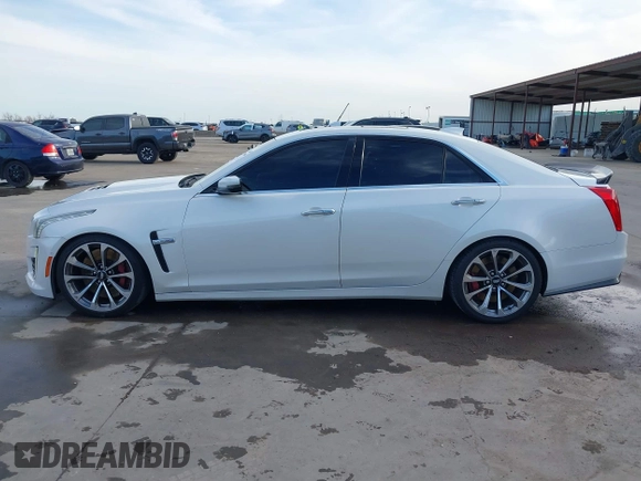 2017 Cadillac CTS-V z VIN 1G6A15S64H0137358, wystawiony jako IAAI lot #41336455 z przebiegiem 76 367 mil mil oraz . Historia ofert i sprzedaży dostępna na DreamBid. Obrazek 14.