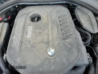 2018 BMW 7 Series 740i with VIN WBA7E2C58JG742736, listed as a Copart auction lot 62137585 with 118,548 mi miles and Salvage title. Bid and sale history available at DreamBid. Image 13.