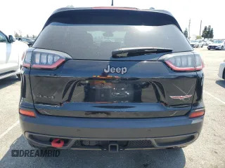 2021 Jeep Cherokee Trailhawk with VIN 1C4PJMBX8MD167153, listed as a Copart auction lot 54929845 with 52,800 mi miles and Clean title. Bid and sale history available at DreamBid. Image 6.