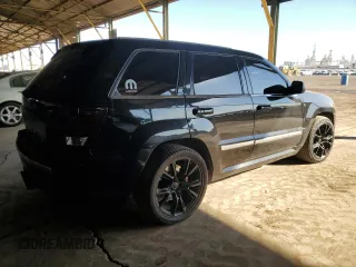 2008 Jeep Grand Cherokee SRT-8 with VIN 1J8HR78358C160930, listed as a Copart auction lot 80562324 with 137,147 mi miles and Salvage Title. Bid and sale history available at carsss.com. Image 3.